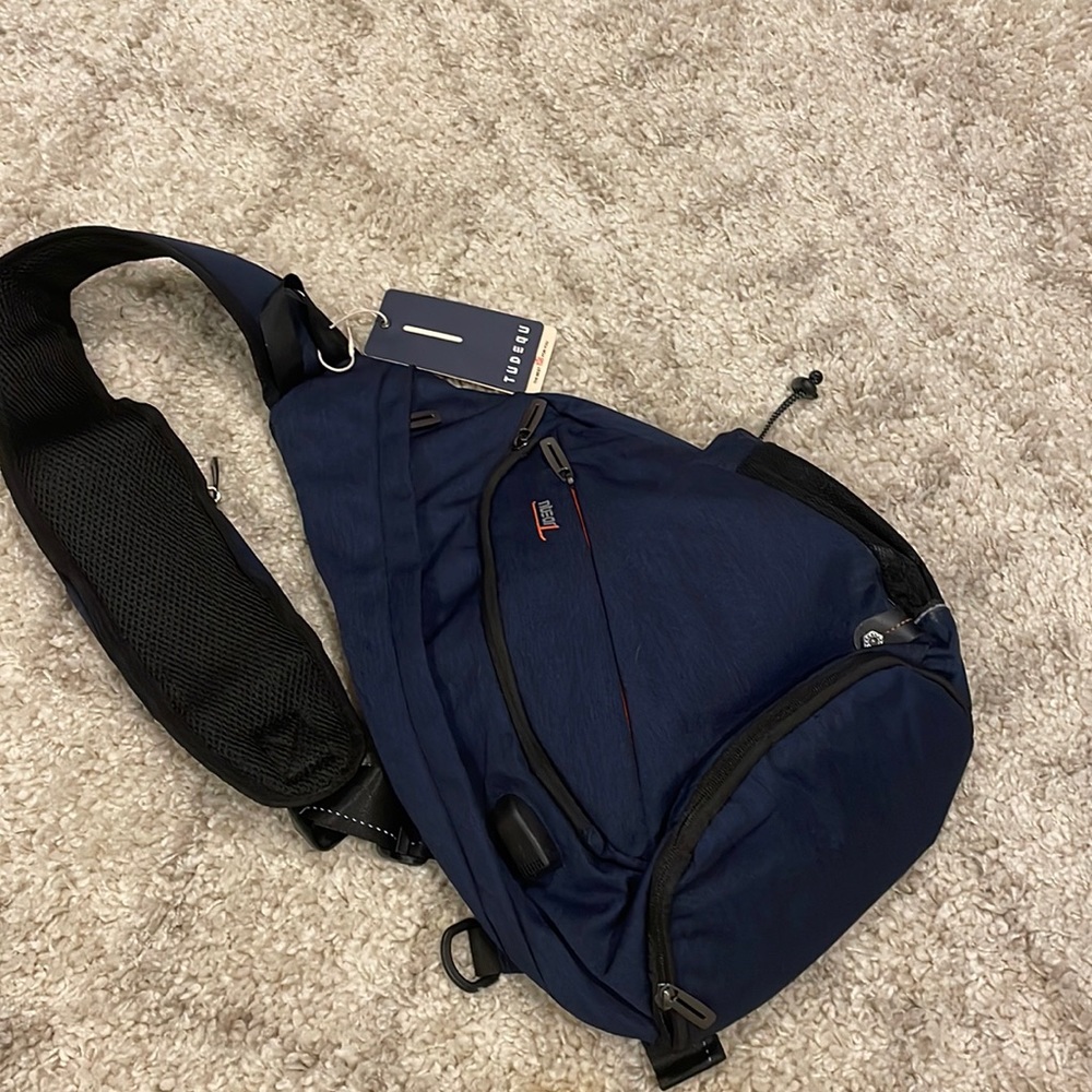 NWT SLING BACKPACK